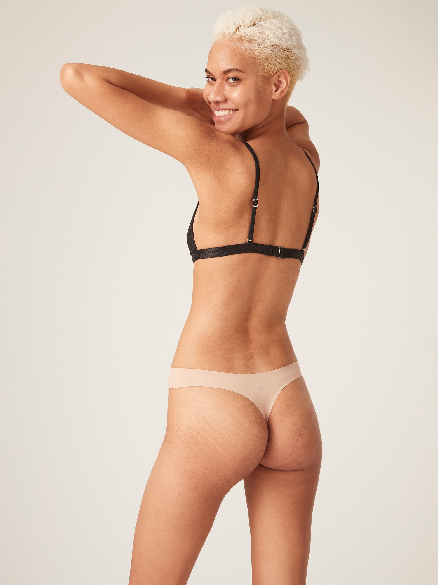 Menstruační tanga Modibodi Seamfree Thong Light Cashew (MTMSTLMC) XL